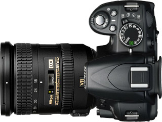 Nikon D3100 + 18-200mm